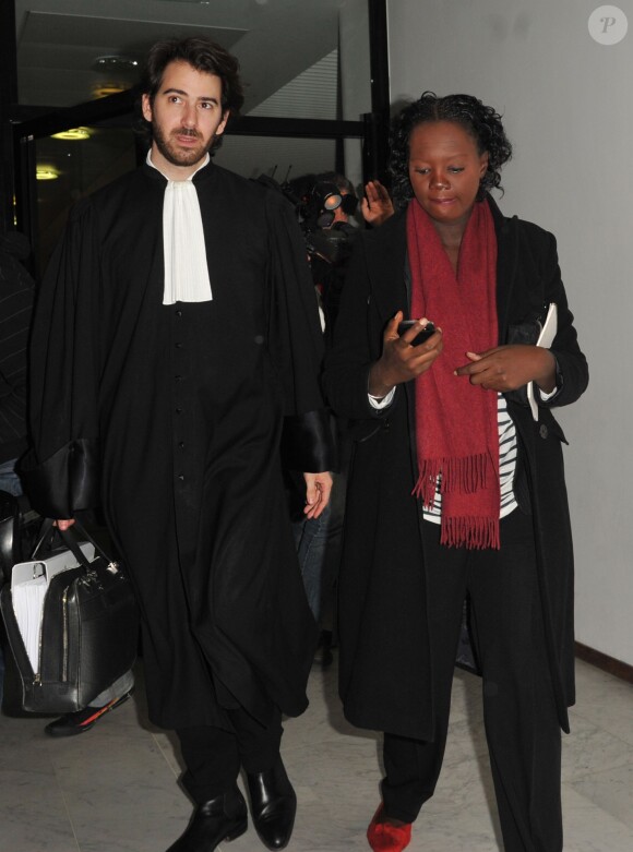 Rama Yade (enceinte) arrive au tribunal de Nanterre, le 28 février 2013, avec son avocat Me Levy. Elle a été relaxée par la justice, le jeudi 28 mars 2013, dans son procès pour faux, usage de faux et inscription indue sur une liste électorale