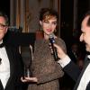 Louise Bourgoin tient le Prix Cinema Patrimoine de Paris lors du 16e Bal de Paris à l'hôtel Le Marois. Paris, le 7 décembre 2013.