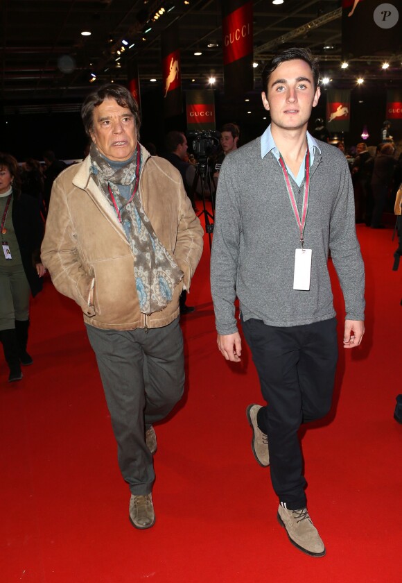 Bernard Tapie et le compagnon de sa fille Sophie, Raphaël Goerhs au Gucci Paris Masters à Villepinte le 7 décembre 2013.