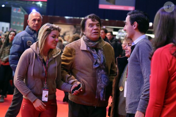 Bernard Tapie avec sa femme Dominique, sa fille Sophie Tapie et son compagnon Raphaël Goerhs au Gucci Paris Masters à Villepinte le 7 décembre 2013.