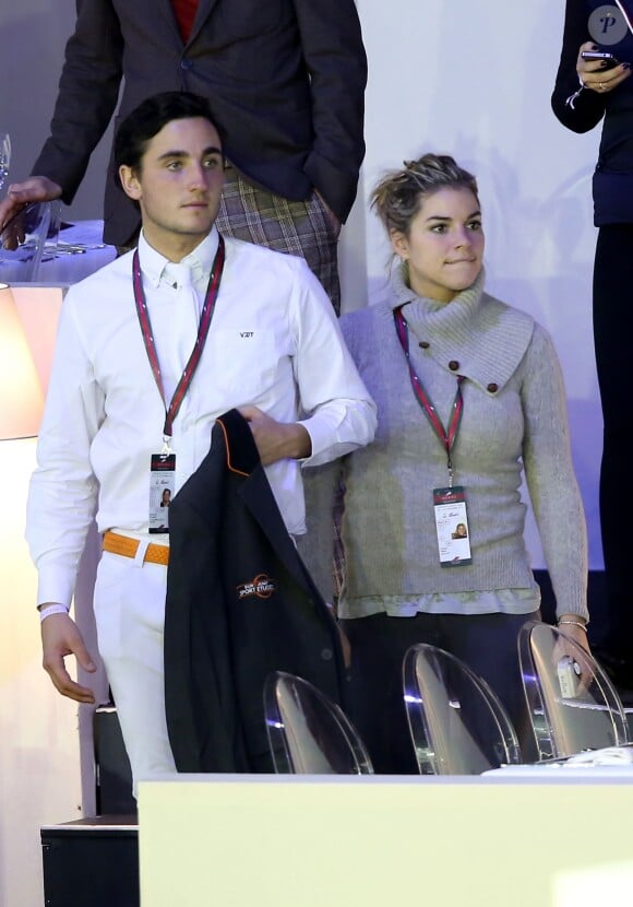Exclusif - La jolie Sophie Tapie et son compagnon le cavalier Raphaël Goehrs au Gucci Masters de Villepinte le 6 decembre 2013.
