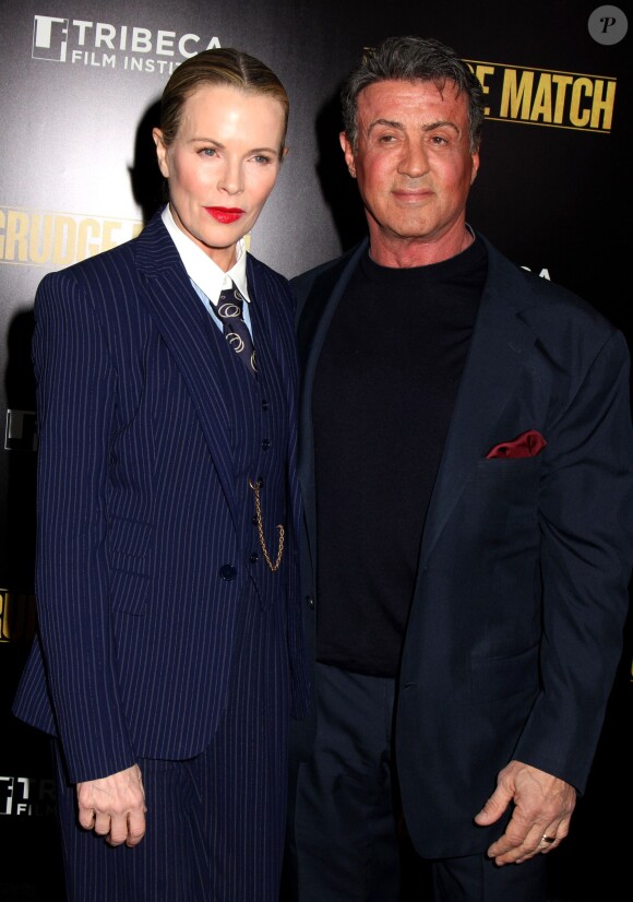 Kim Basinger et Sylvester Stallone lors de l'avant-première du film Match retour à New York le 16 décembre 2013