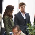 Jamie Dornan et Dakota Johnson en action sur le tournage du film Fifty Shades of Grey à Vancouver, le 19 décembre 2013.