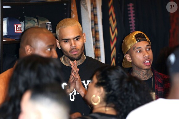 Chris Brown et son ami rappeur Tyga assistent à l'événement XMas Toy Drive à West Hollywood. Le 22 décembre 2013.