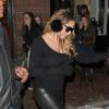 Mariah Carey, sous bonne escorte lors de sa séance shopping à Aspen. Le 23 décembre 2013.