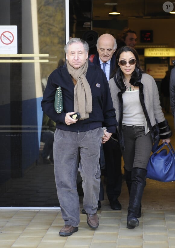 Jean Todt et Michelle Yeoh au chevet de Jean Todt accompagné du professeur Gérard Saillant à la sortie du CHU de Grenoble, le 31 décembre 2013