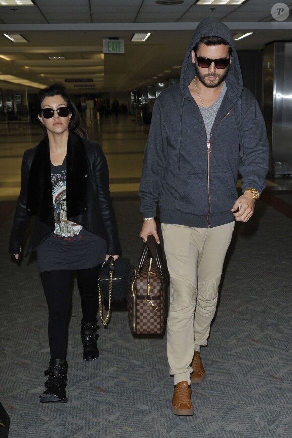 Kourtney Kardashian et Scott Disick à l'aéroport de Los Angeles, le 5 janvier 2014.