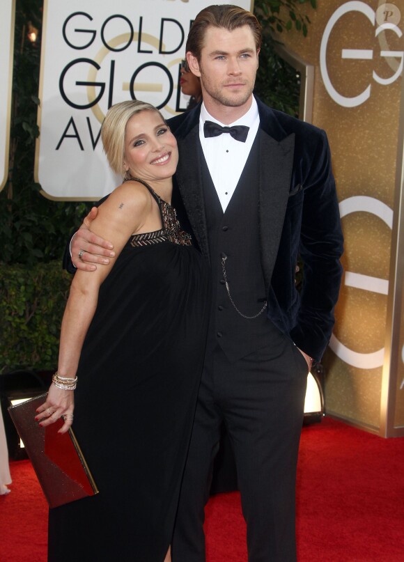Chris Hemsworth et sa femme Elsa Pataky enceinte lors de la 71e cérémonie des Golden Globe Awards à Beverly Hills le 12 janvier 2014.