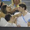 Camille Lacourt et son épouse Valérie Bègue lors de la night session entre Vincent Millot et Andy Murray à l'Open d'Australie au Melbourne Park de Melbourne, le 16 janvier 2014