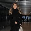 Kim Kardashian va prendre un avion a l'aeroport de Heathrow a Londres, le 18 janvier 2014. Kim Kardashian quitte Londres ou elle n'a passe que 5 heures.
