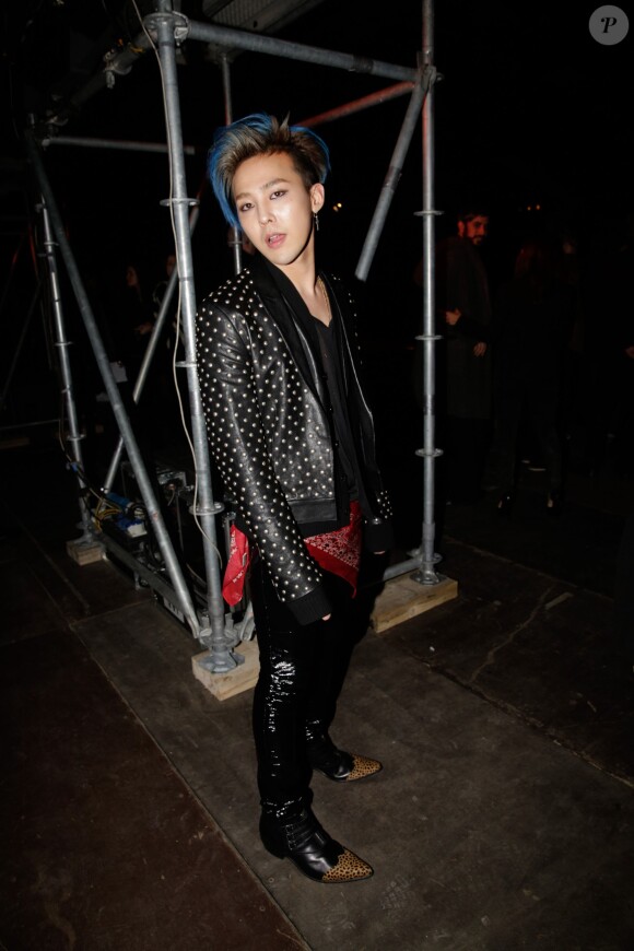 G-Dragon lors du défilé Saint Laurent homme automne-hiver 2014-2015 à l'hôtel des Invalides. Paris, le 19 janvier 2014.