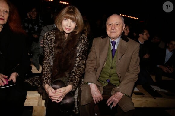 Anna Wintour et Pierre Bergé assistent au défilé Saint Laurent homme automne-hiver 2014-2015 à l'hôtel des Invalides. Paris, le 19 janvier 2014.