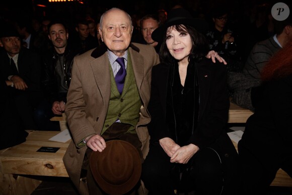 Pierre Berge et Juliette Greco assistent au défilé Saint Laurent homme automne-hiver 2014-2015 à l'hôtel des Invalides. Paris, le 19 janvier 2014.