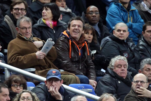 Jean-Luc Reichmann et sa femme Nathalie lors du match du tournoi des VI Nations entre la France et l'Angleterre au Stade de France à Saint-Denis, le 1er février 2014