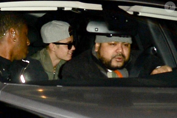 Le chanteur Justin Bieber à New York le 31 janvier 2014, quittant son hôtel dans une Rolls Royces pour se rendre à la soirée du magazine Maxim