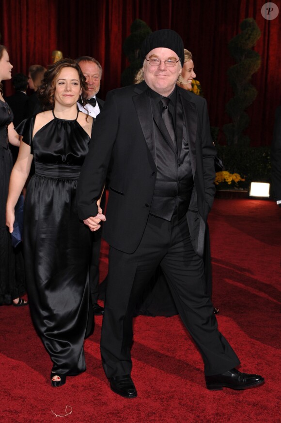 Philip Seymour Hoffman et sa compagne Mimi O'Donnell lors de la cérémonie des Oscars au Kodak Theater de Los Angeles, le 22 février 2009