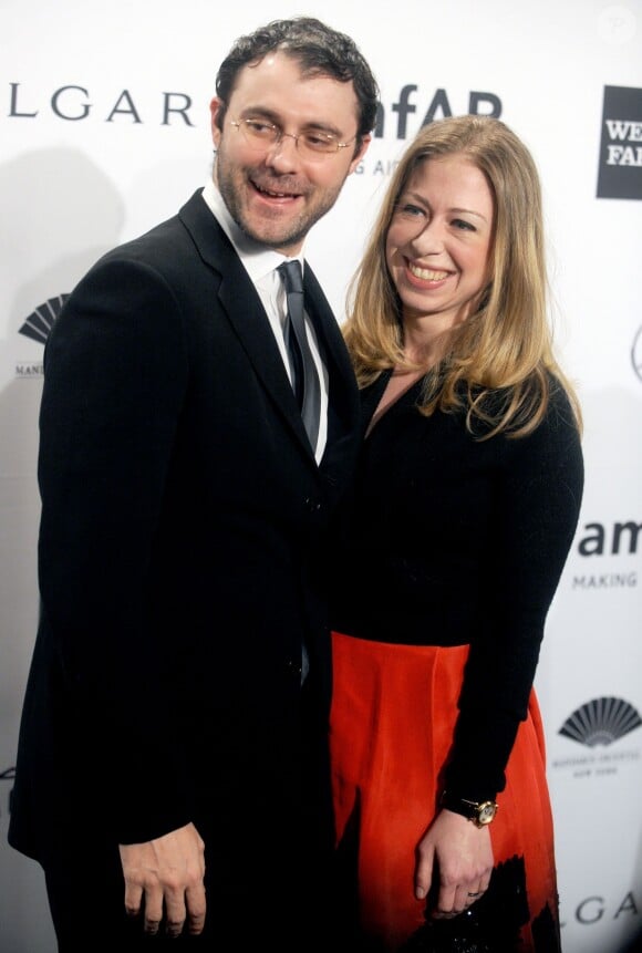 Chelsea Clinton et son époux Marc Mezvinsky au gala de l'amfAR en ouverture de la Fashion Week de New York, le 5 février 2014.