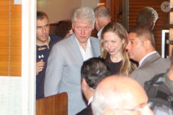 Bill Clinton et sa fille Chelsea à Rio de Janeiro, le 7 décembre 2013.
