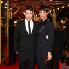 Jalil Lespert et sa compagne Sonia Rolland (costume noir de la marque Costume National et chaussures en velours noir de la marque Christian Louboutin) lors de la première du film "Yves Saint Laurent" lors du 64eme Festival International du Film de Berlin, le 7 février 2014.