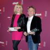Emmanuelle Seigner (Meilleure Actrice) et son mari Roman Polanski (Meilleur Réalisateur) au déjeuner des nommés aux César au Fouquet's à Paris, le 8 février 2014.