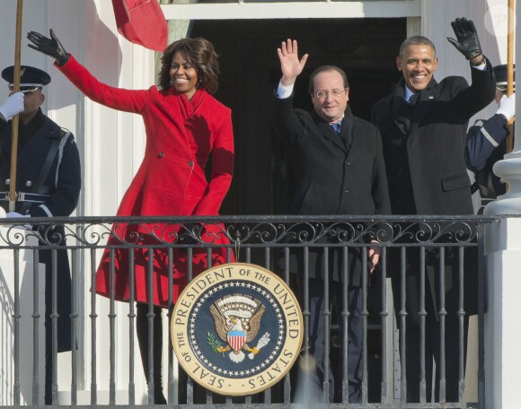 First lady Michelle Obama, President Francois Hollande of France, and United States President Barack Obama wave to the crowd following a State arrival ceremony on the South Lawn of the White House in Washington, DC, USA, on Tuesday, February 11, 2014. Photo by Ron Sachs/CNP/ABACAPRESS.COM11/02/2014 - Washington