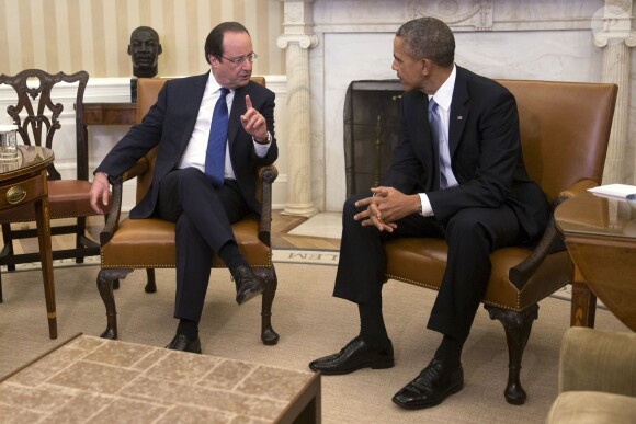 U.S. President Barack Obama, right, meets with Francois Hollande, France's president, in the Oval Office of the White House in Washington, DC, USA, on Tuesday, February 11, 2014. For an elite group of established and rising U.S. and French executives, tonight's state dinner and the other events held in conjunction with Hollande's U.S. visit provide a chance to network, burnish their images and lay the groundwork for future deals. Photo by Andrew Harrer/Pool/ABACAPRESS.COM11/02/2014 - Washington