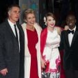 Emma Thompson en famille avec son mari Greg Wise, leur fille Gaia et leur fils adoptif Tindy lors de la cérémonie des BAFTA Awards à Londres le 16 février 2014