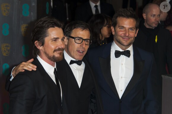 Christian Bale, David O Russell et Bradley Cooper lors de la cérémonie des BAFTA à Londres le 16 février 2014