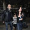 Courteney Cox avec sa fille Coco et son petit ami Johnny McDaid à l'aéroport LAX de Los Angeles, le 14 février 2014.