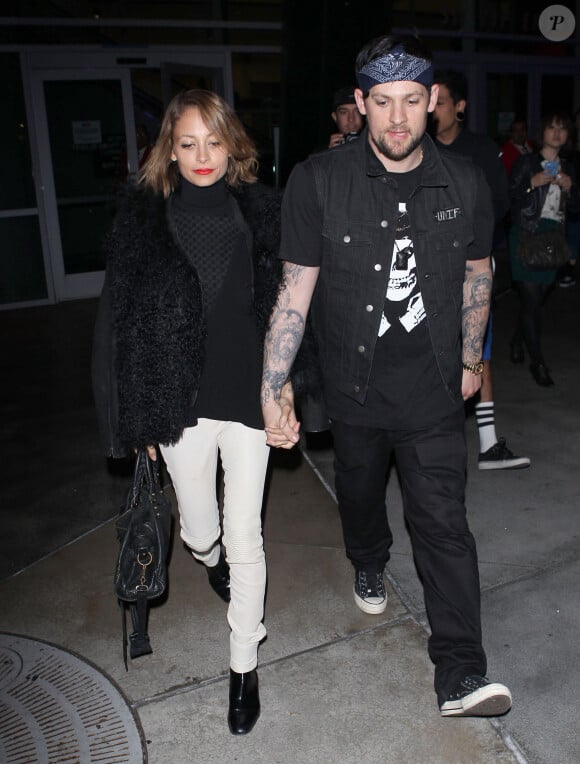 Nicole Richie et son mari Joel Madden se rendent au concert de Miley Cyrus au Staples Center de Los Angeles, le 23 février 2014.