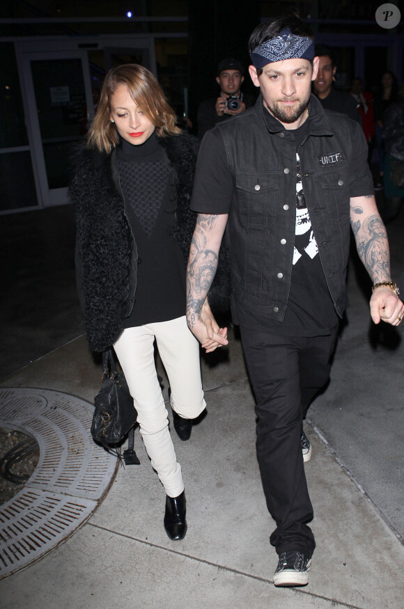 Nicole Richie et son mari Joel Madden se rendant au concert de Miley Cyrus à Los Angeles, le 23 février 2014.