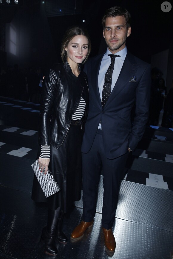 Olivia Palermo et son fiancé Johannes Huebl au défilé H&M au Grand Palais à Paris, le 26 février 2014.