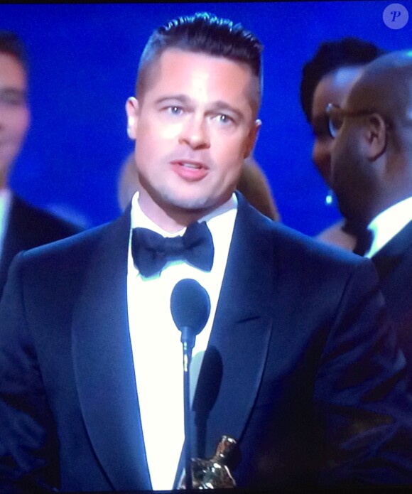 Brad Pitt pour 12 Years A Slave, meilleur film aux Oscars 2014.