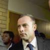 Oscar Pistorius à son arrivée au tribunal de Pretoria pour le second jour de son procès, le 4 mars 2014