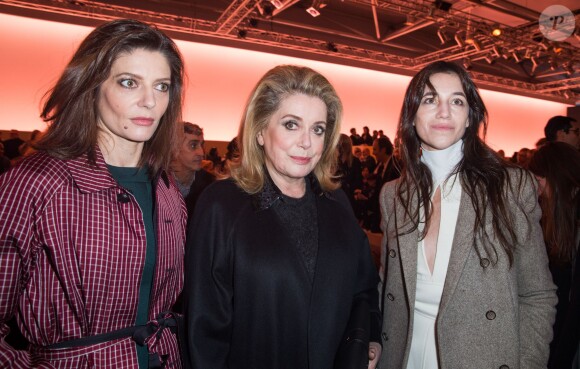 Exclusif - Chiara Mastroianni, Catherine Deneuve et Charlotte Gainsbourg au défilé Louis Vuitton à Paris, le 5 mars 2014.