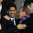 Nasser Al-Khelaïfi et Bertrand Delanoë lors du match entre le Paris Saint-Germain et le Bayer Leverkusen, huitième de finale retour de la Ligue des Champions au Parc des Princes à Paris le 12 mars 2014