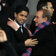 Nasser Al-Khelaïfi et Bertrand Delanoë lors du match entre le Paris Saint-Germain et le Bayer Leverkusen, huitième de finale retour de la Ligue des Champions au Parc des Princes à Paris le 12 mars 2014