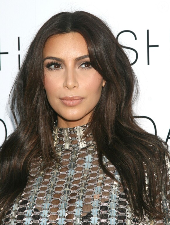 Kim Kardashian - Les soeurs Kardashian à l'ouverture de la boutique Dash à Miami, le 12 mars 2014.