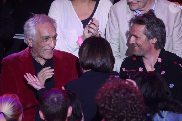Gérard Darmon, Yvan Le Bolloc'h, et Anne Hidalgo lors de son dernier grand meeting de campagne au Cirque d'Hiver à Paris, dix jours avant le premier tour des élections municipales, le 13 mars 2014.