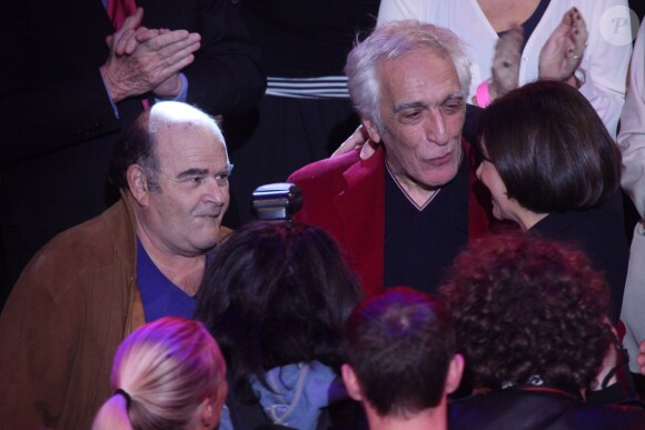Gérard Darmon, Jean Benguigui, et Anne Hidalgo lors de son dernier grand meeting de campagne au Cirque d'Hiver à Paris, dix jours avant le premier tour des élections municipales, le 13 mars 2014.