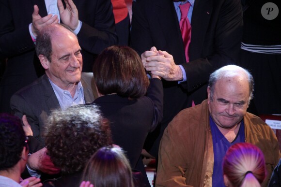 Pierre Lescure, Jean Benguigui et Anne Hidalgo lors de son dernier grand meeting de campagne au Cirque d'Hiver à Paris, dix jours avant le premier tour des élections municipales, le 13 mars 2014.