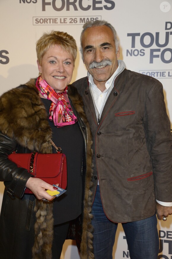 Mansour Bahrami et sa femme Véronique lors de l'avant-première du film "De Toutes Nos Forces" au Gaumont Opéra à Paris, le 17 mars 2014