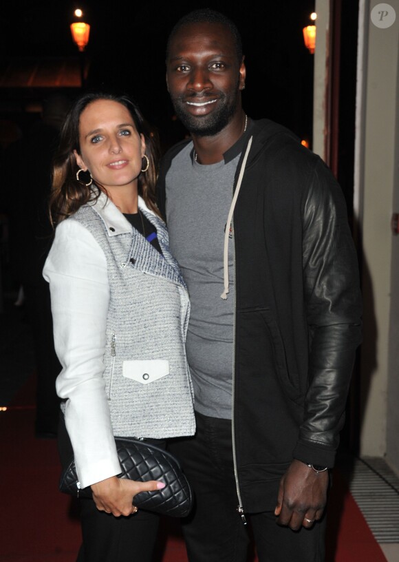 Omar Sy et sa femme Hélène lors de la soirée pour la sortie du jeu "Fifa 14" à la Gaité Lyrique à Paris le 23 septembre 2013
