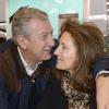 Richard et Cécilia Attias, complices, à la 34e édition du Salon du livre, Porte de Versailles à Paris le 23 mars 2014.