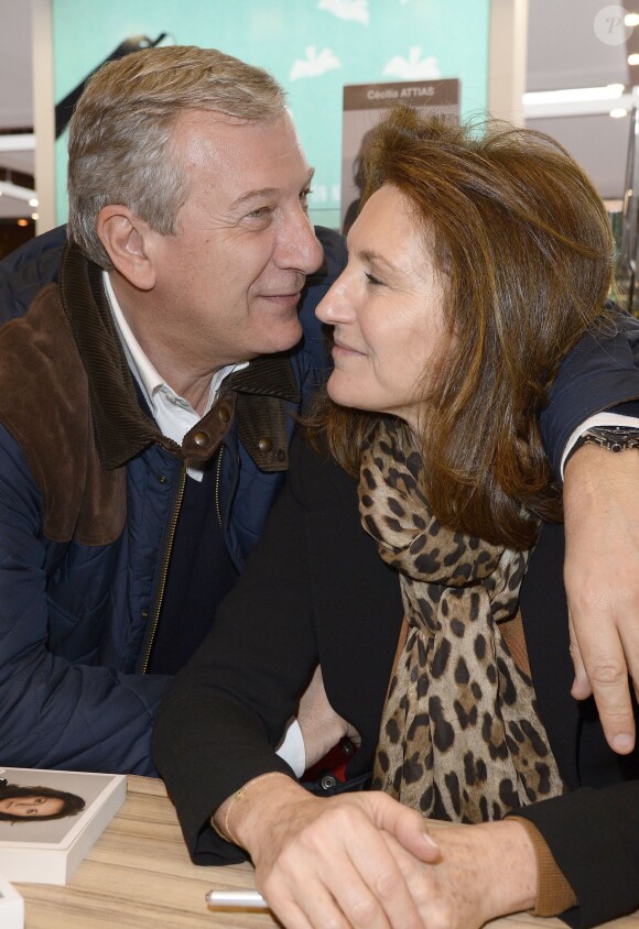 Richard et Cécilia Attias, complices, à la 34e édition du Salon du livre, Porte de Versailles à Paris le 23 mars 2014.