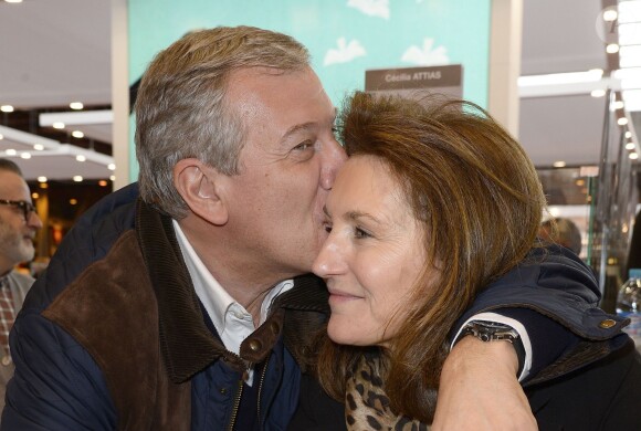 Cécilia et Richard Attias à la 34e édition du Salon du livre, Porte de Versailles à Paris le 23 mars 2014.