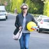 Exclusif - Charlize Theron se rend à une fête d'anniversaire à Beverly Hills, habillée d'une veste Smythe, d'un sac Rag & Bone et de chaussures Soludos. Le 22 mars 2014.
