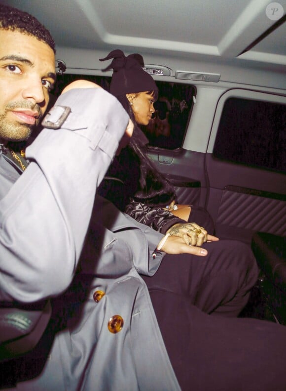 Drake et Rihanna, main dans la main à Londres, le 27 mars 2014.