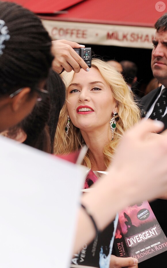 Kate Winslet dans une robe Jenny Packham lors de l'avant-première du film "Divergente" à Londres, le 30 mars 2014
