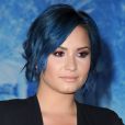Demi Lovato chante Let It Go. Elle est ici lors de la première du film à Hollywood, Los Angeles, le 19 novembre 2013.
